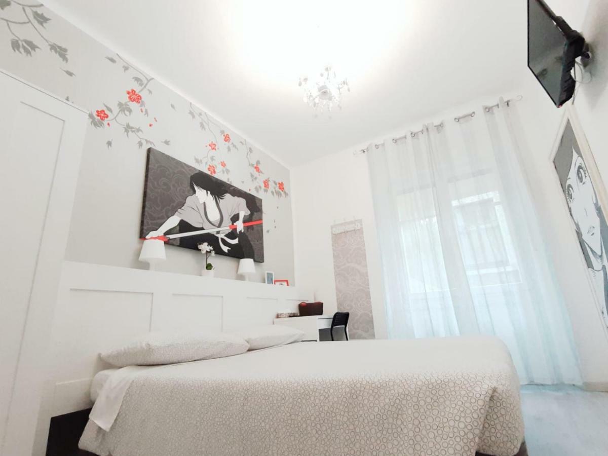 Camera Matrimoniale/Doppia con Letti Singoli con Bagno in Comune